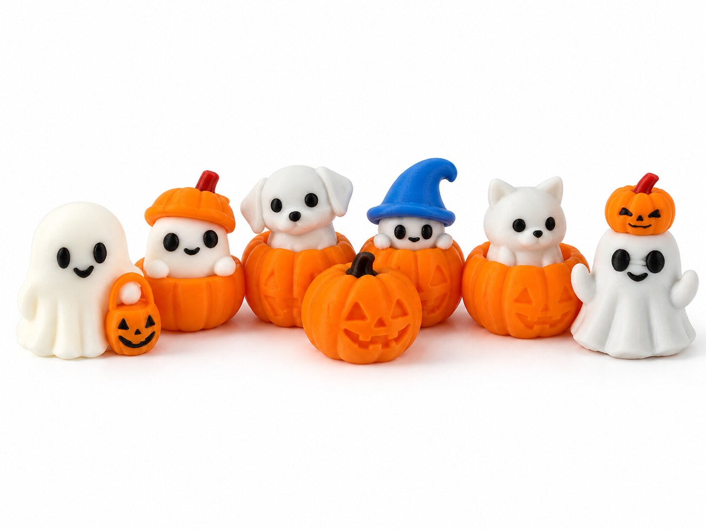 All seven Halloween coffee lid toppers together on a white background